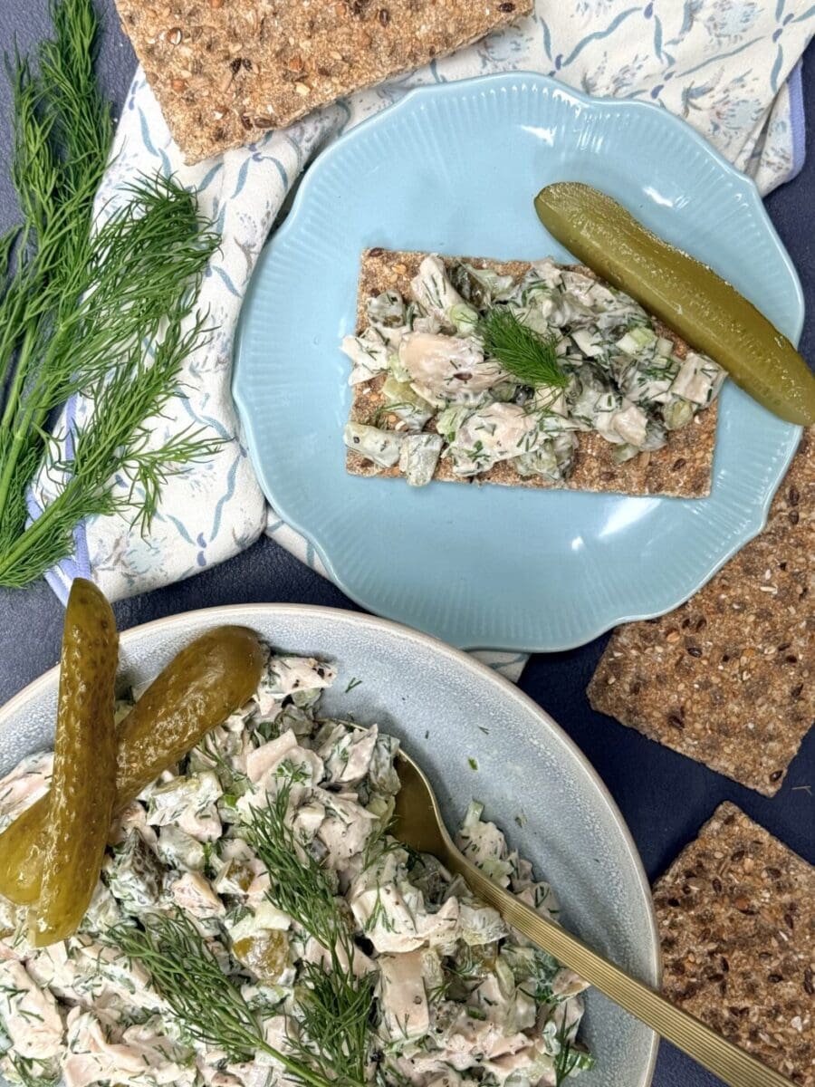 Creamy dill pickle chicken salad is served on seedy crisp bread.