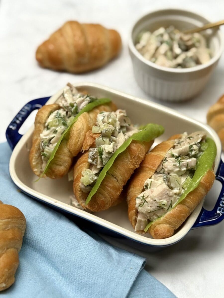 Greek Yogurt Dill Pickle Chicken Salad is served on flaky mini croissants.