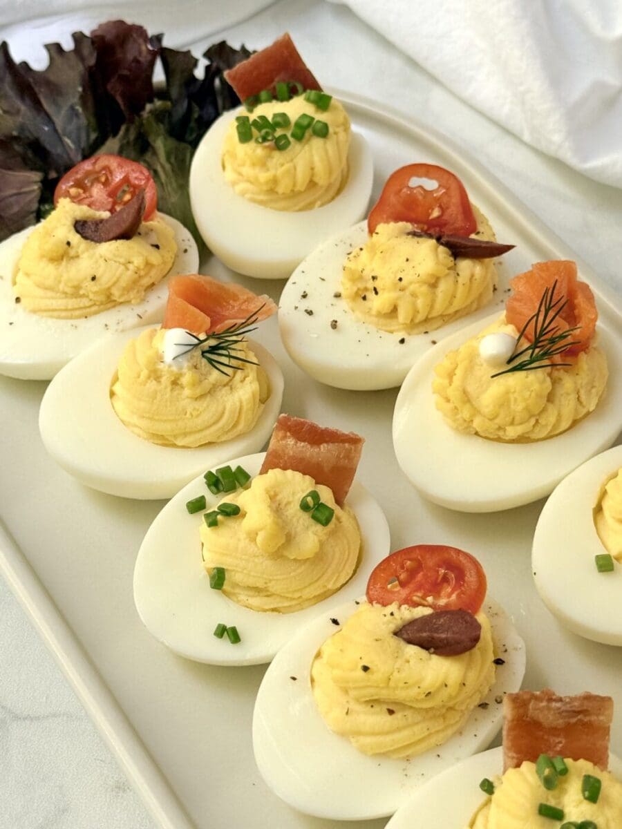 Devilled eggs are heaped high with creamy filling and decorated with delicious and beautiful toppings.