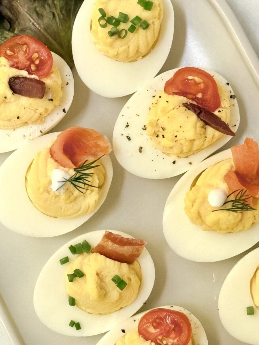 Devilled eggs are dressed up with savoury toppings for a beautiful and easy to eat appetizer